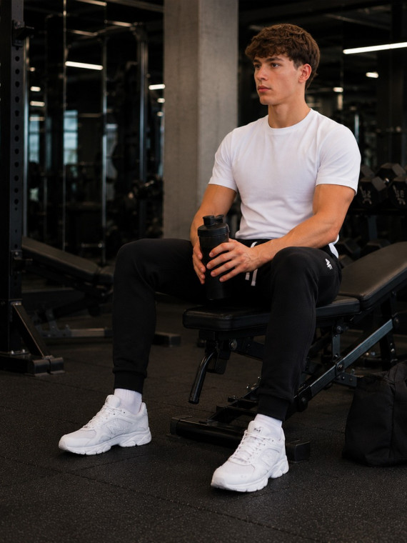 4F Spodnie dresowe męskie sportowe joggery TTROM2096 głęboka czerń XXL