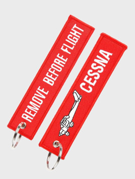 FOSTEX GARMENTS Brelok Lotniczy REMOVE BEFORE FLIGHT Cesna Czerwony