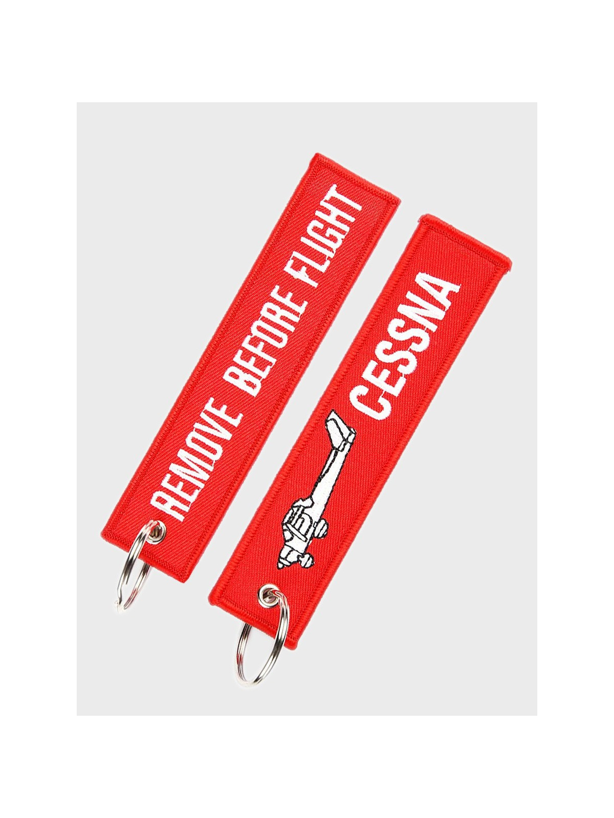FOSTEX GARMENTS Brelok Lotniczy REMOVE BEFORE FLIGHT Cesna Czerwony