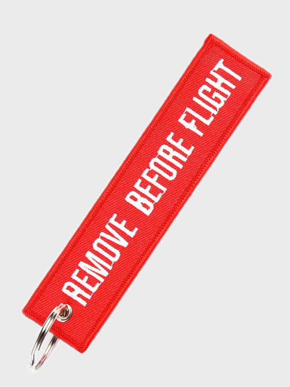FOSTEX GARMENTS Brelok Lotniczy REMOVE BEFORE FLIGHT Cesna Czerwony